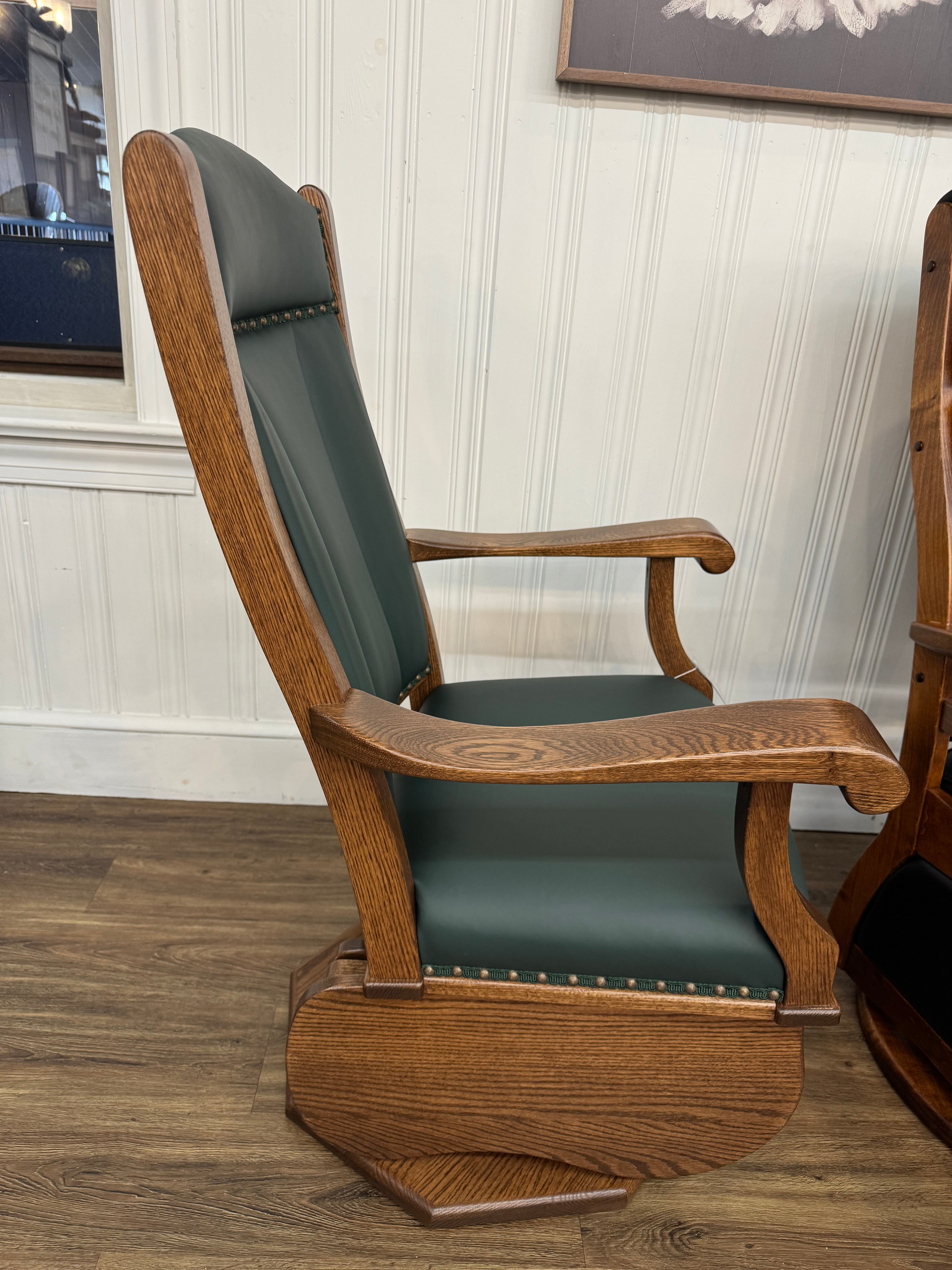 Side view of Amish made swivel glider rocker chair in solid oak with hunter green upholstered cushions – handcrafted furniture