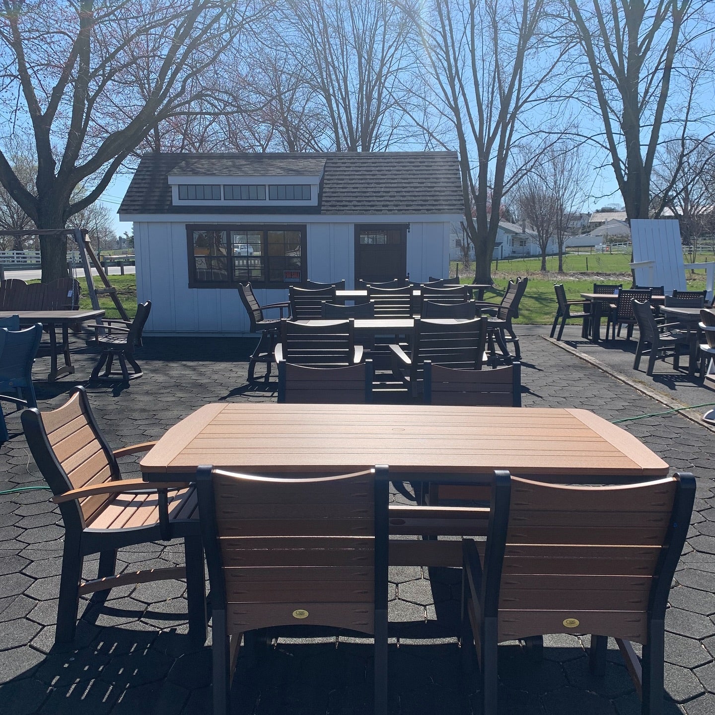 Amish made Bayshore patio dining table with four matching side chairs and one arm chair - quality outdoor poly furniture near Lancaster, Pennsylvania