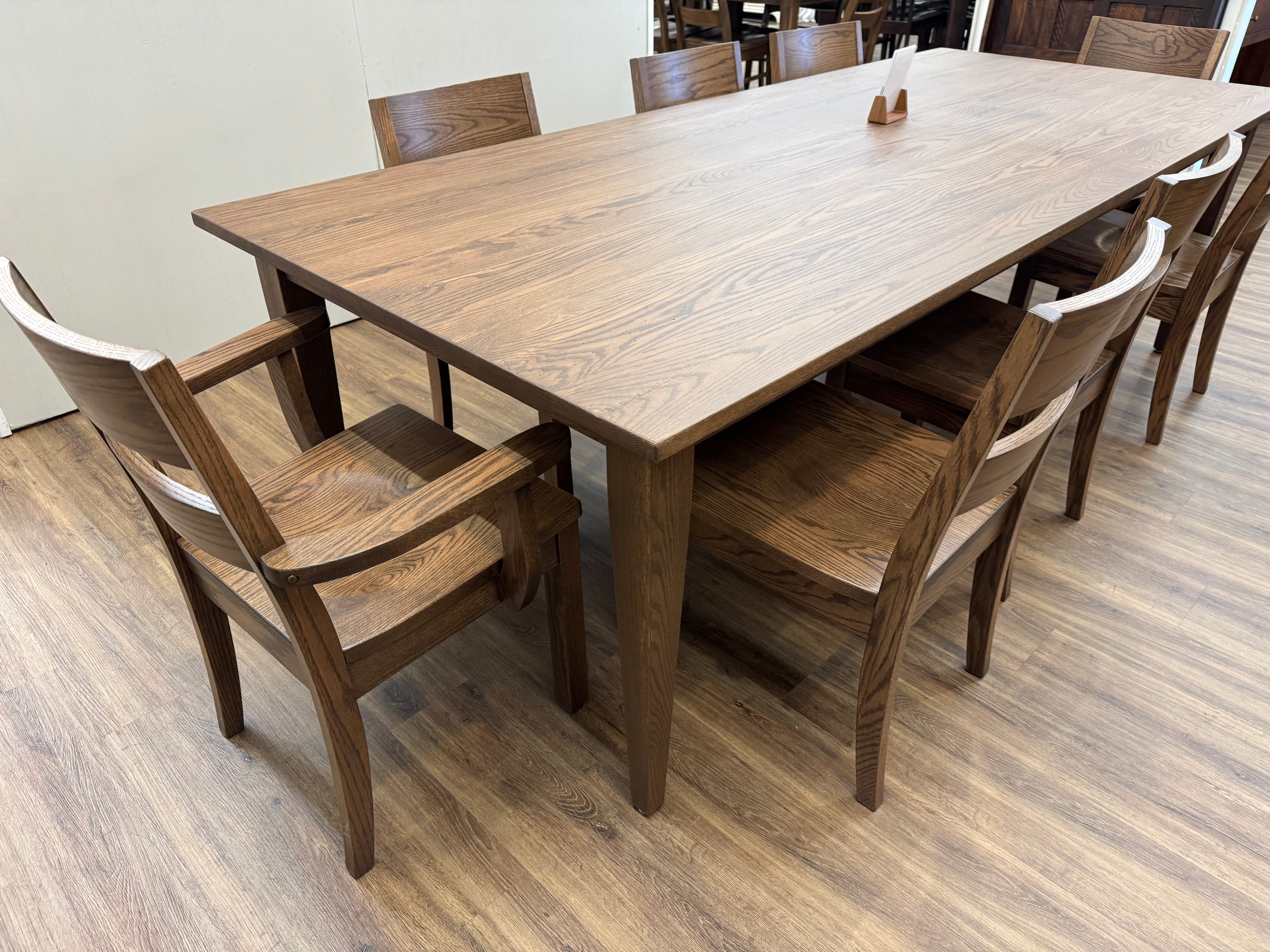 Amish made shaker leg dining table in solid oak, with eight matching chairs - handcrafted furniture near Lancaster Pennsylvania