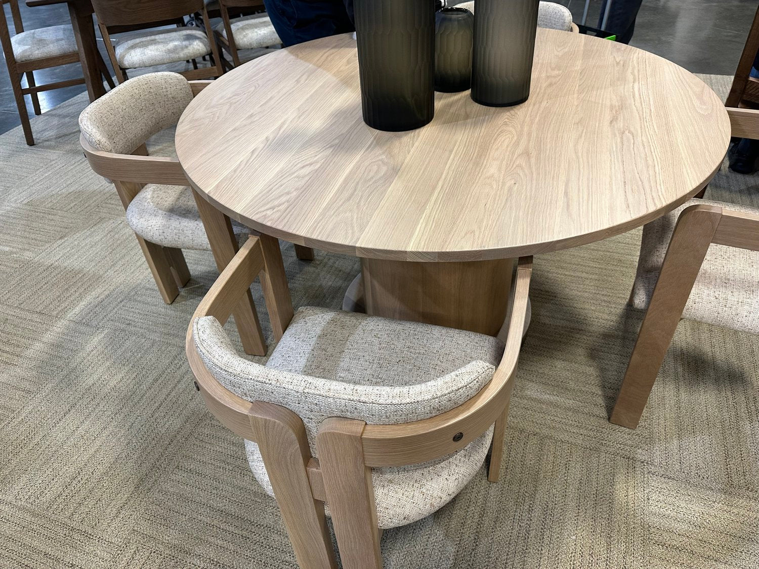 Amish made round Buxton 54 inch table in solid oak  and four matching chairs with beautiful cloth upholstery - handcrafted furniture