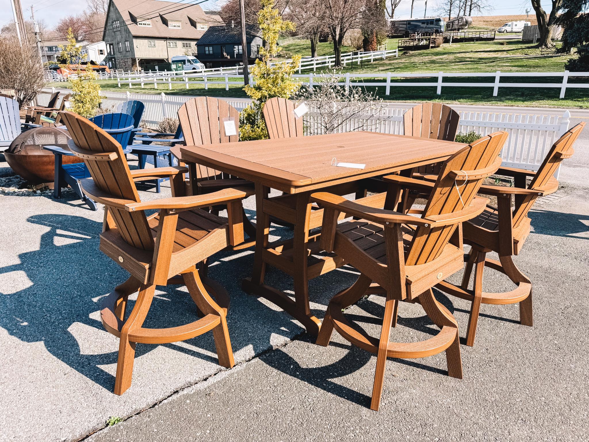 Bayshore outdoor pub table with  six matching swivel chairs in brown - outdoor patio furniture 